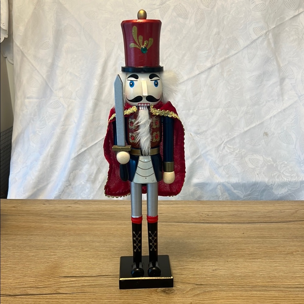 Festive Red Nutcracker Soldier wooden Figurine with cape and sword 15"